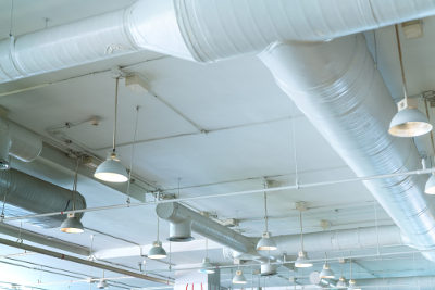 Warehouse ceiling with industrial HVAC piping system